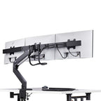 StarTech.com Desk Mount Triple Monitor Arm with Crossbar For Up To Three 27in Screens, VESA 75x75/100x100, Tool-Less Arm Adjustments, C-Clamp/Grommet, Spring-Assisted Arm